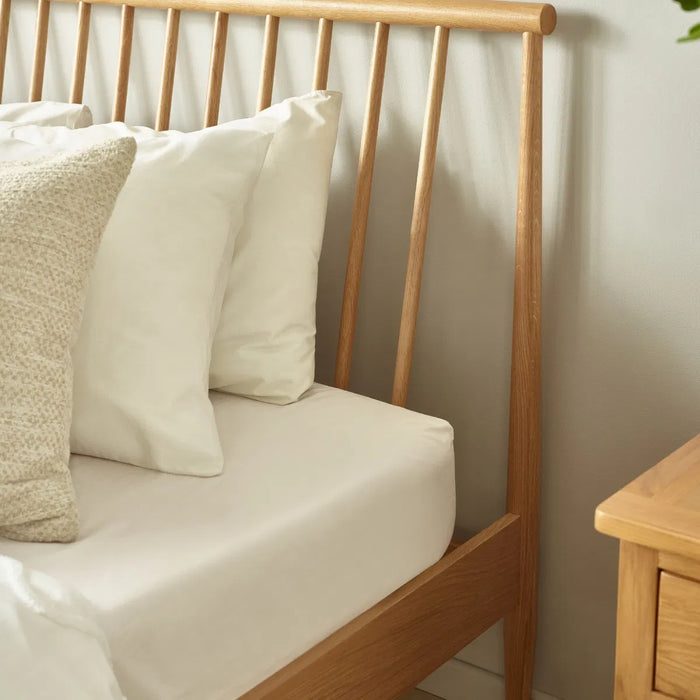 Belton Oak 135cm Spindle Bed